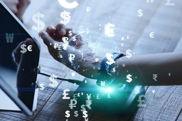What is Dynamic Currency Conversion in cashless payments?